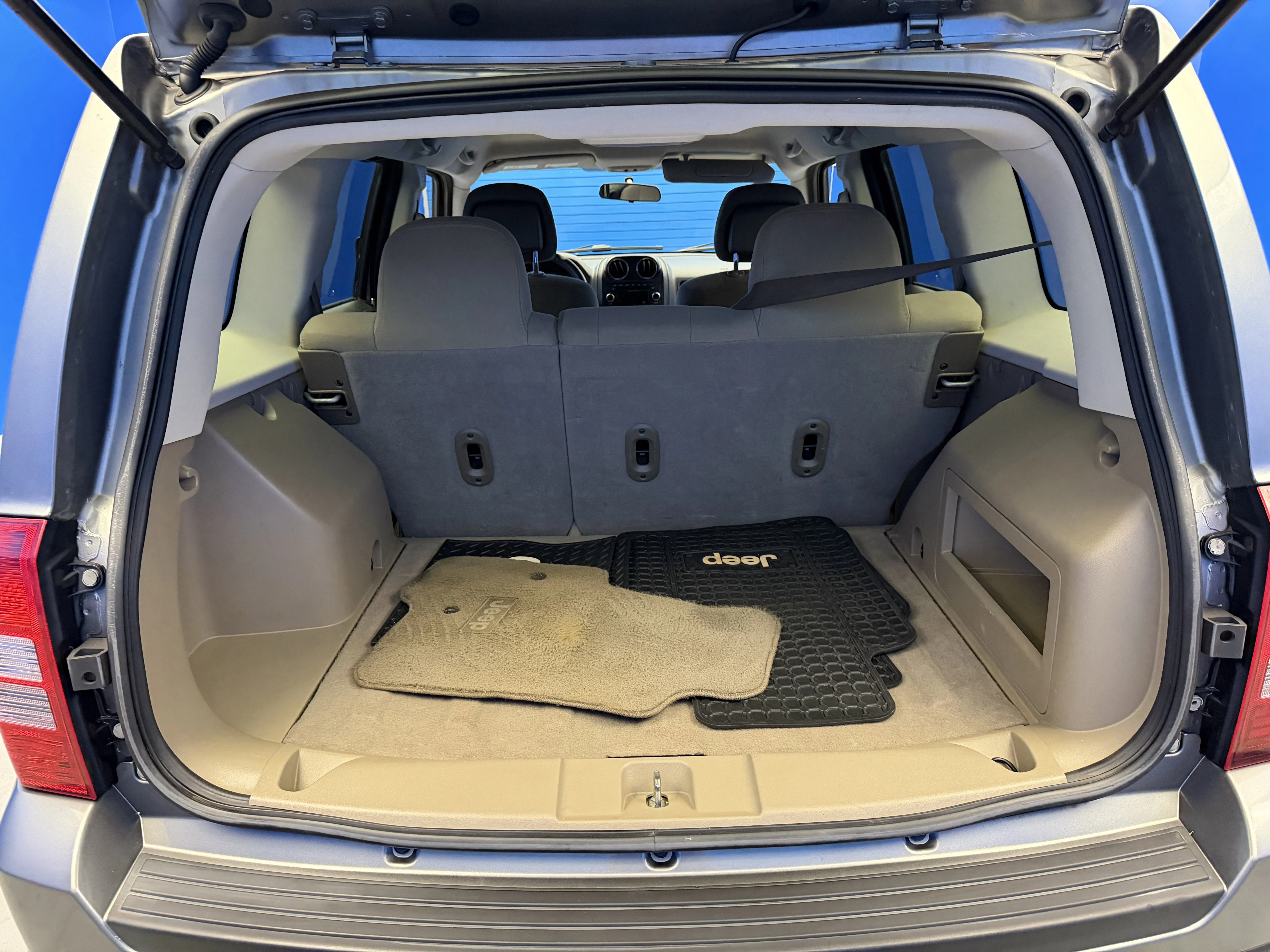 Used 2012 Mineral Gray Metallic Jeep Sport image 23