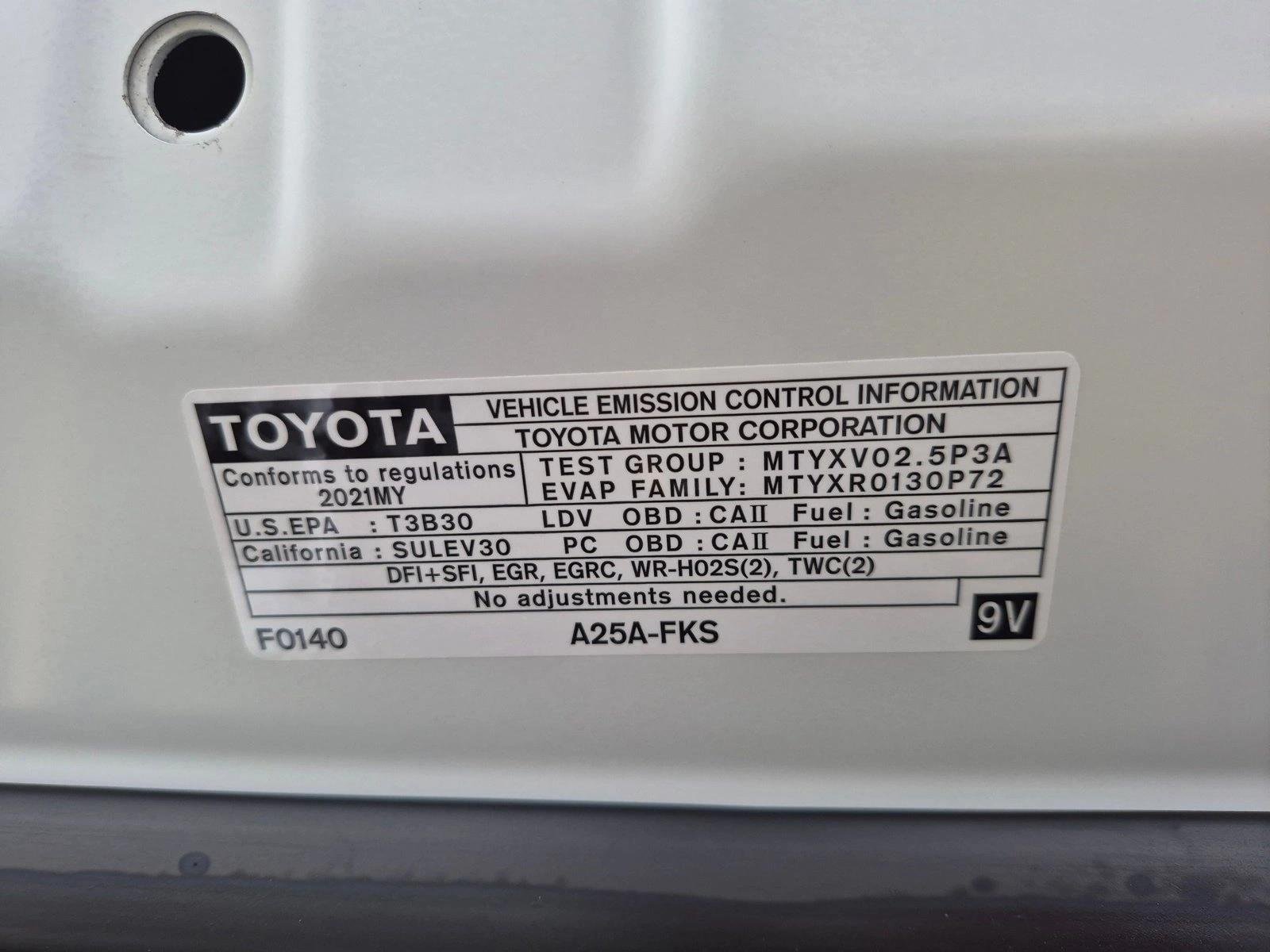 Used 2021 Super White Toyota LE image 23