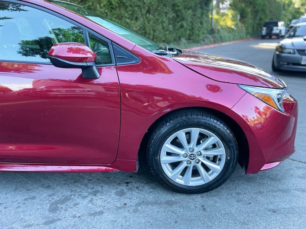 Used 2023 Pearl Toyota LE image 2