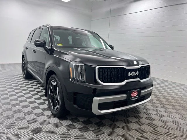 Used 2024 Black Kia EX image 1