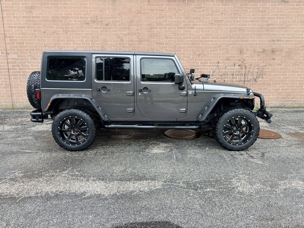 Used 2017 Granite Crystal Metallic Clearcoat Jeep Sport image 6