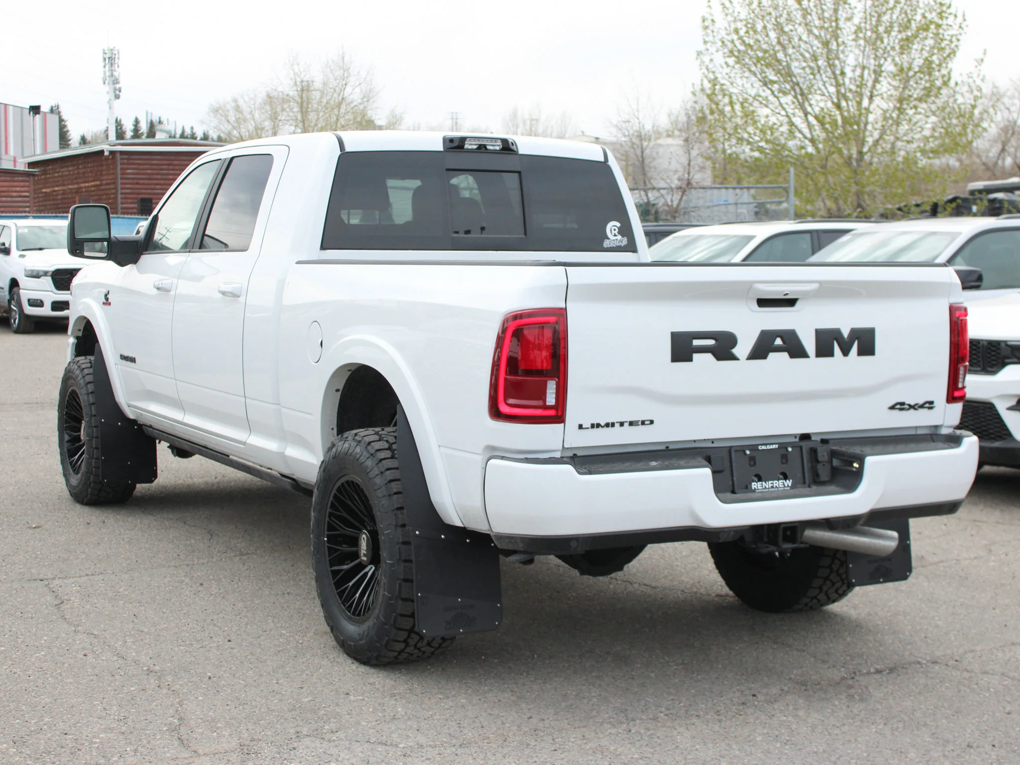 New 2026 White RAM Limited* Mega Cab, 2 Inch Lift, 35 Inch Tires, Trigger Industries Mudflaps image 4