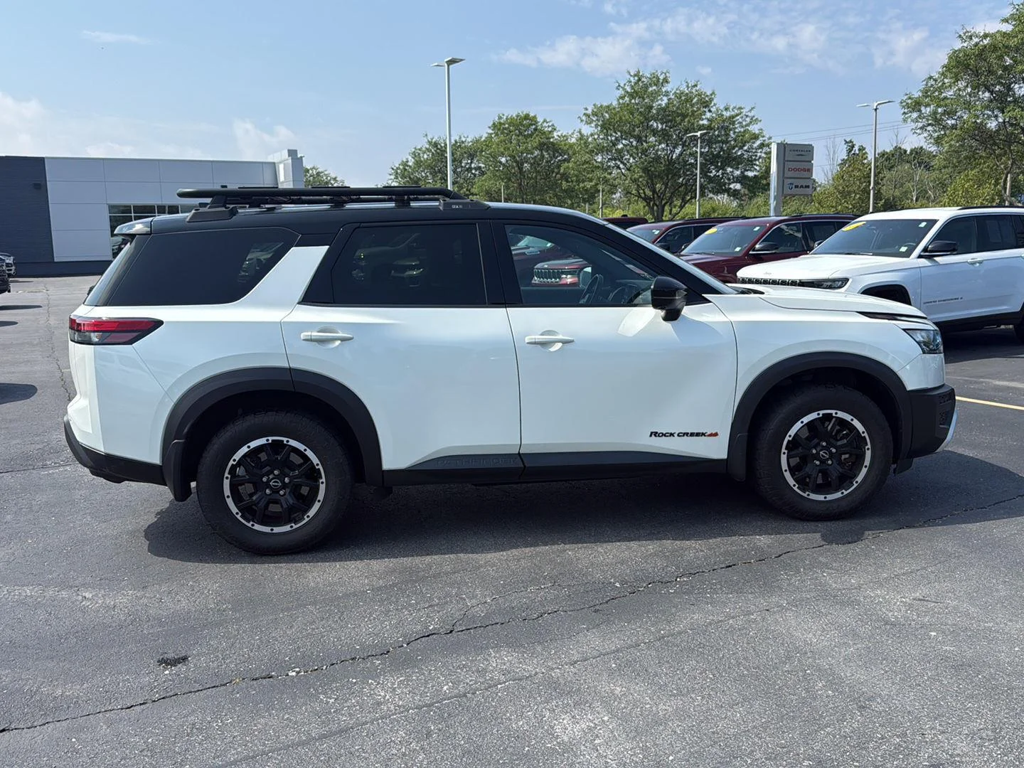 Used 2024 Pearl White Tricoat/Super Black Nissan Rock Creek image 9