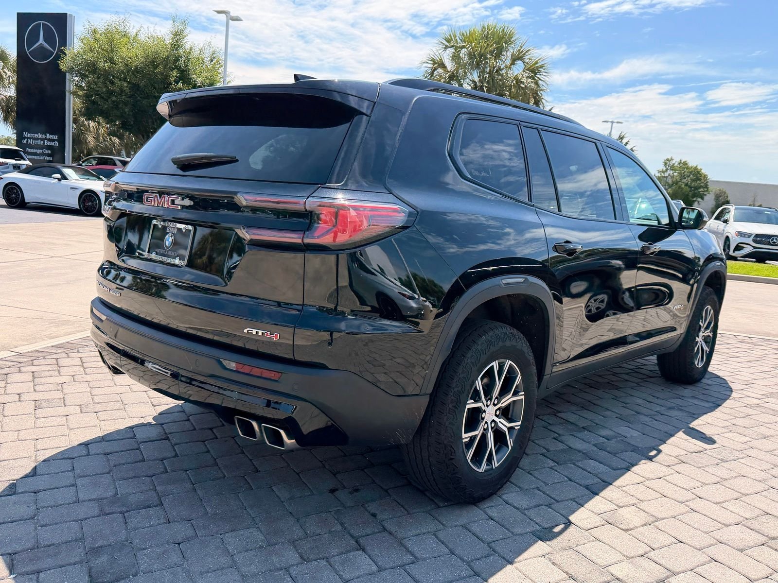 Used 2024 Ebony Twilight Metallic GMC AT4 image 8