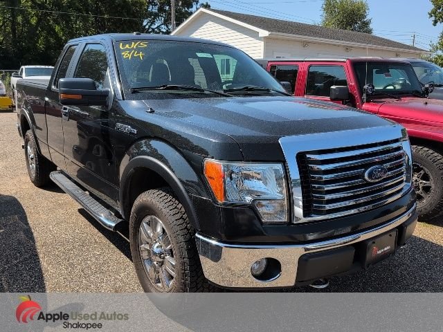 Used 2010 Black Ford XLT image 1