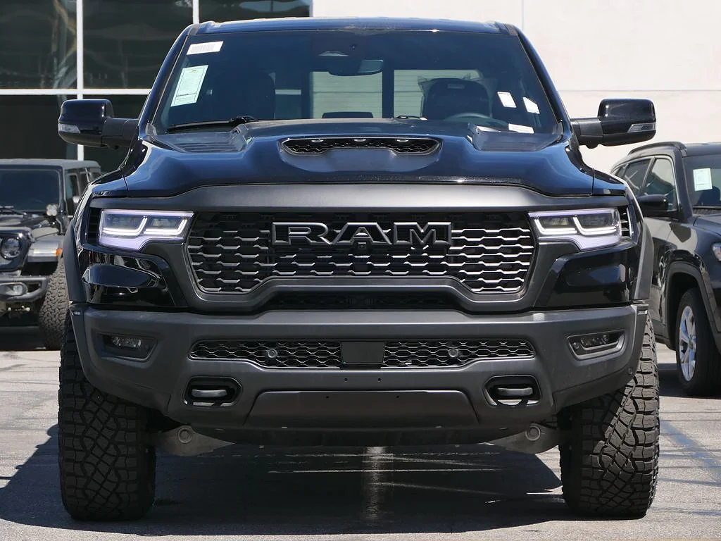 New 2026 Diamond Black Crystal Pearl Coat RAM RHO Crew Cab 4x4 5