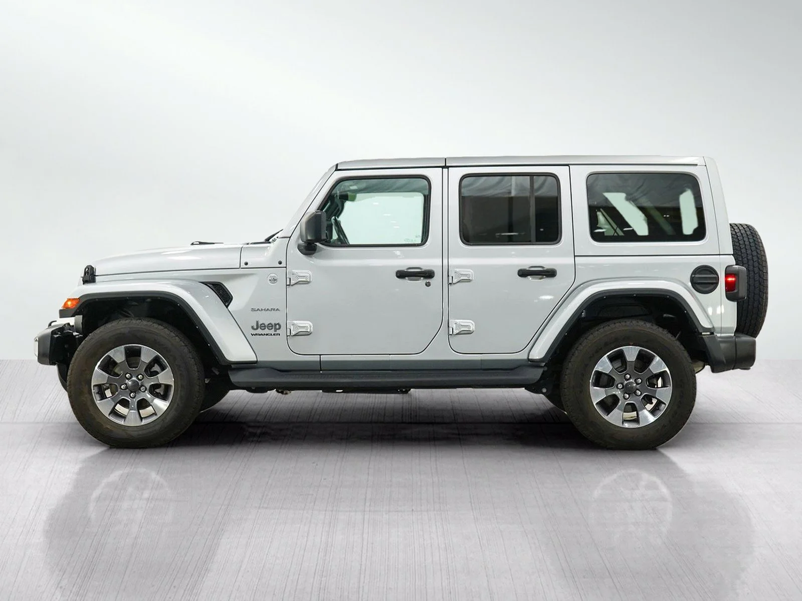 Used 2023 Jeep Wrangler 4-Door Sahara with VIN 1C4HJXEG9PW606841 for sale in Hopkins, Minnesota
