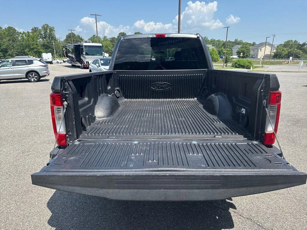 Used 2019 Magnetic Metallic Ford XLT 4WD Crew Cab 6.75 Box image 25