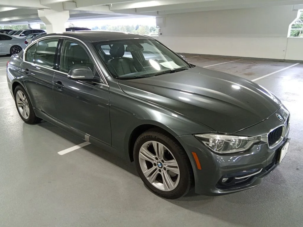 Used 2017 Mineral Gray Metallic BMW 330i xDrive image 3