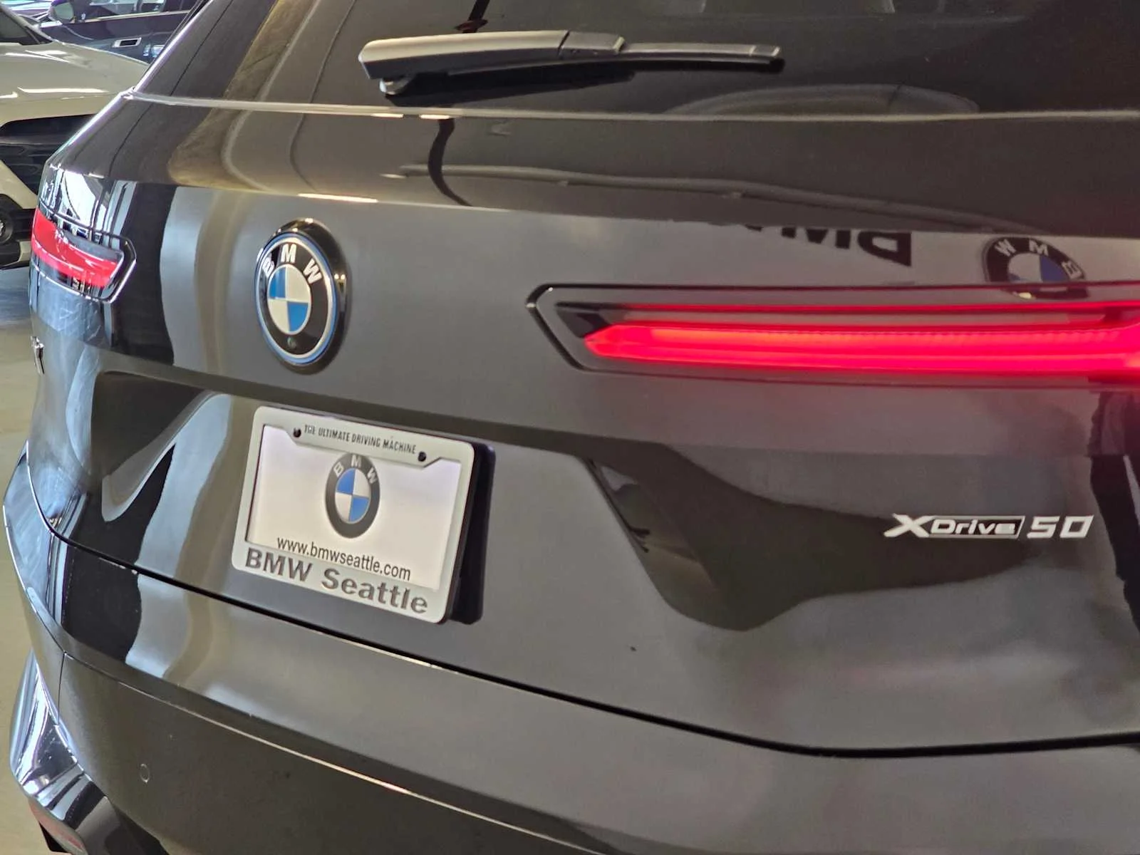 Certified Used 2024 Black Sapphire Metallic BMW xDrive50 image 7