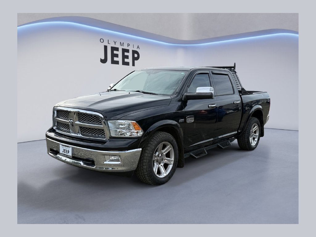 Used 2012 Black Ram Laramie Longhorn image 1