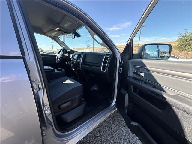 Used 2024 Granite Crystal Metallic Clearcoat RAM SLT 4x4 Quad Cab 6.3 ft. box 140 in. WB image 27