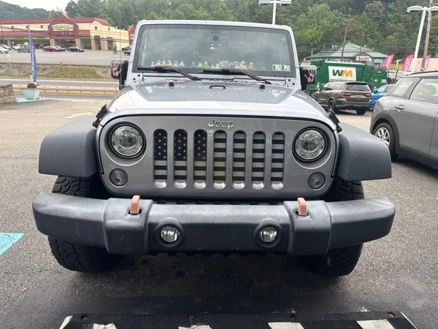 Used 2017 Silver Jeep Unlimited Sport image 1