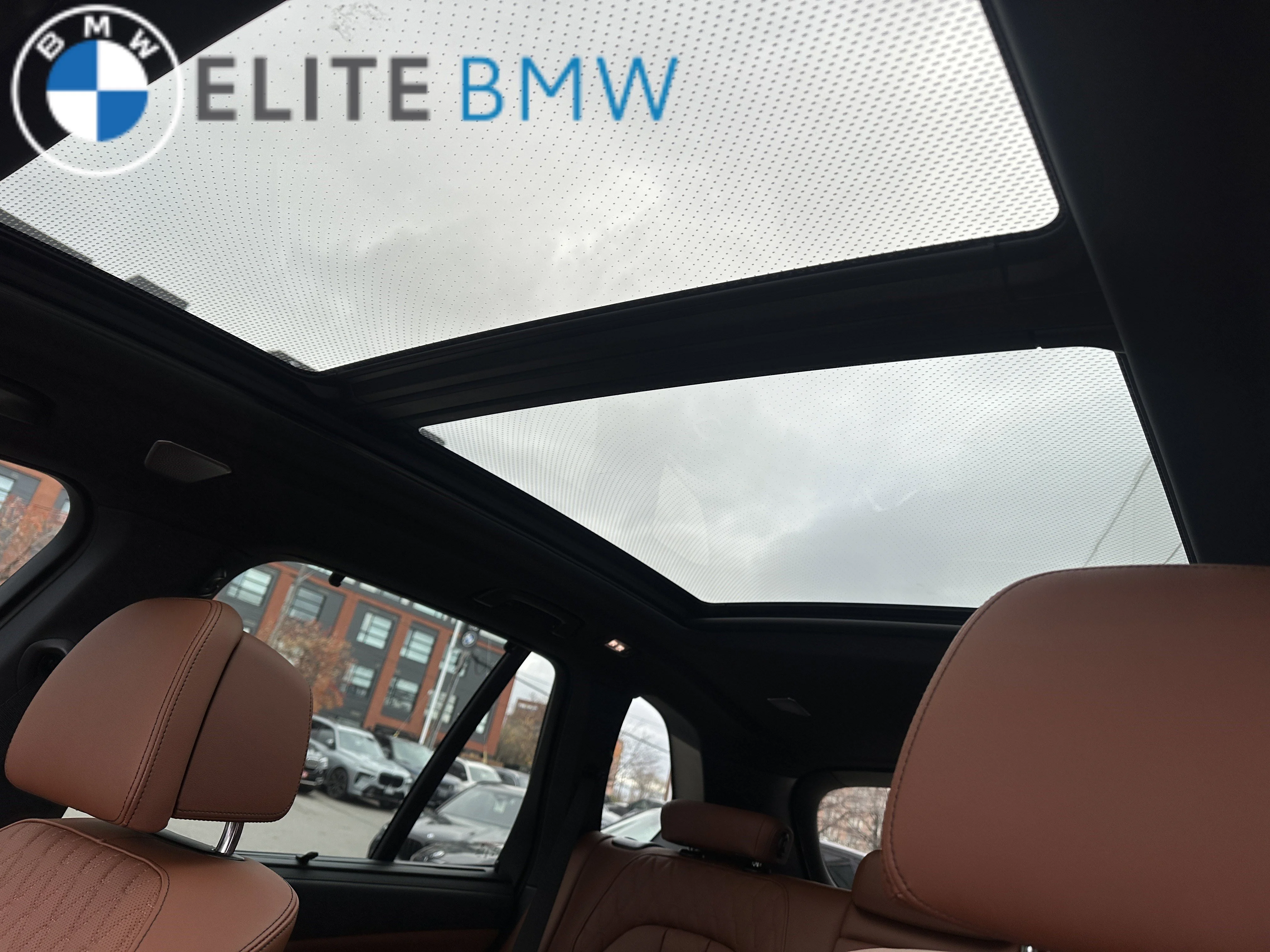 Used 2026 BLACK SAPPHIRE METALLIC BMW XDRIVE40I image 6