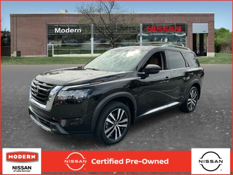 Used 2024 Super Black Nissan Platinum image 1