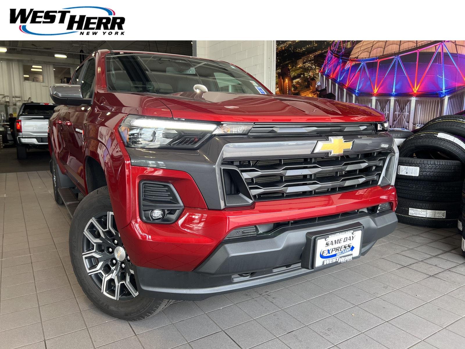 Used 2023 Radiant Red Tintcoat Chevrolet 4WD LT image 1