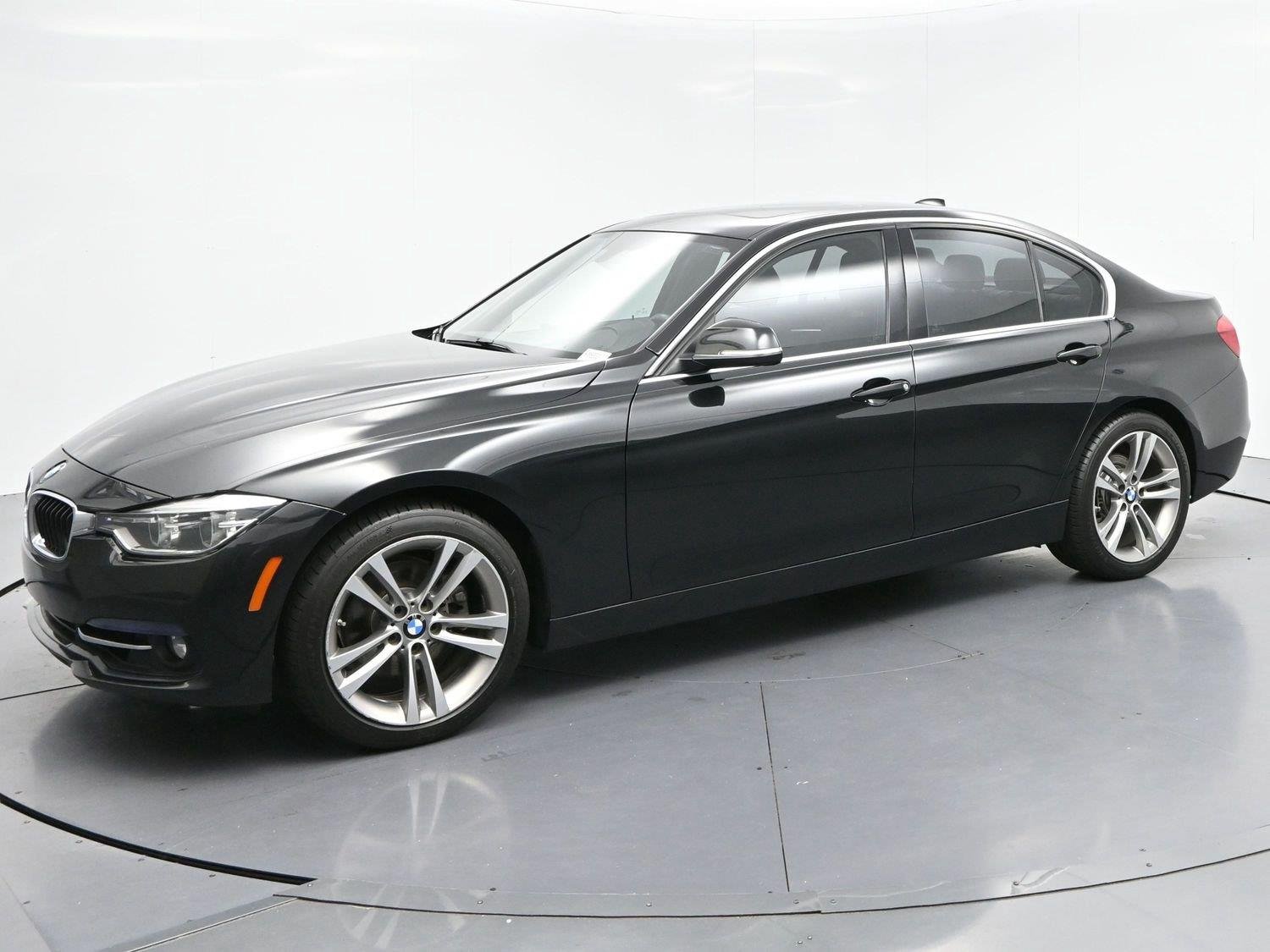 Used 2018 Black Sapphire Metallic BMW 330i image 4
