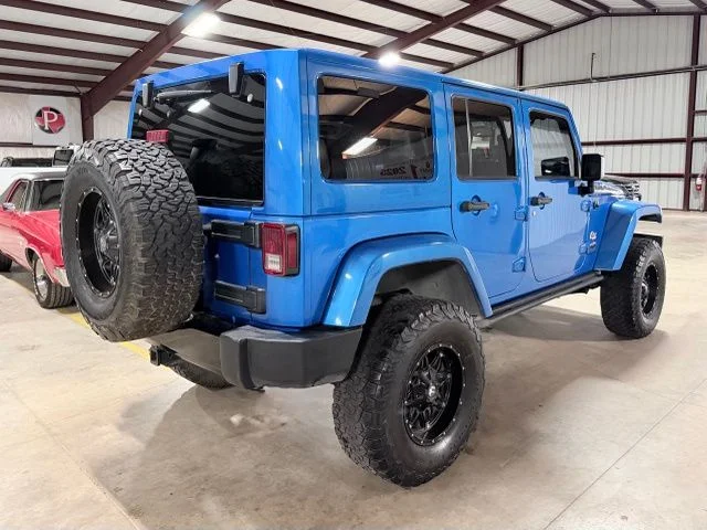 Used 2014 Blue Jeep Unlimited Sahara image 3