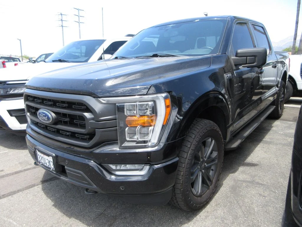Certified Used 2023 Agate Black Metallic Ford XLT image 1