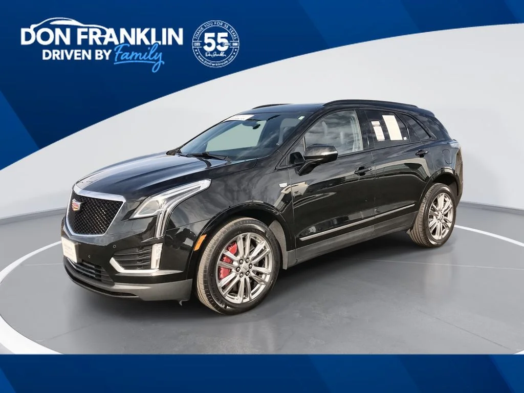 Used 2024 Black Cadillac Sport image 1