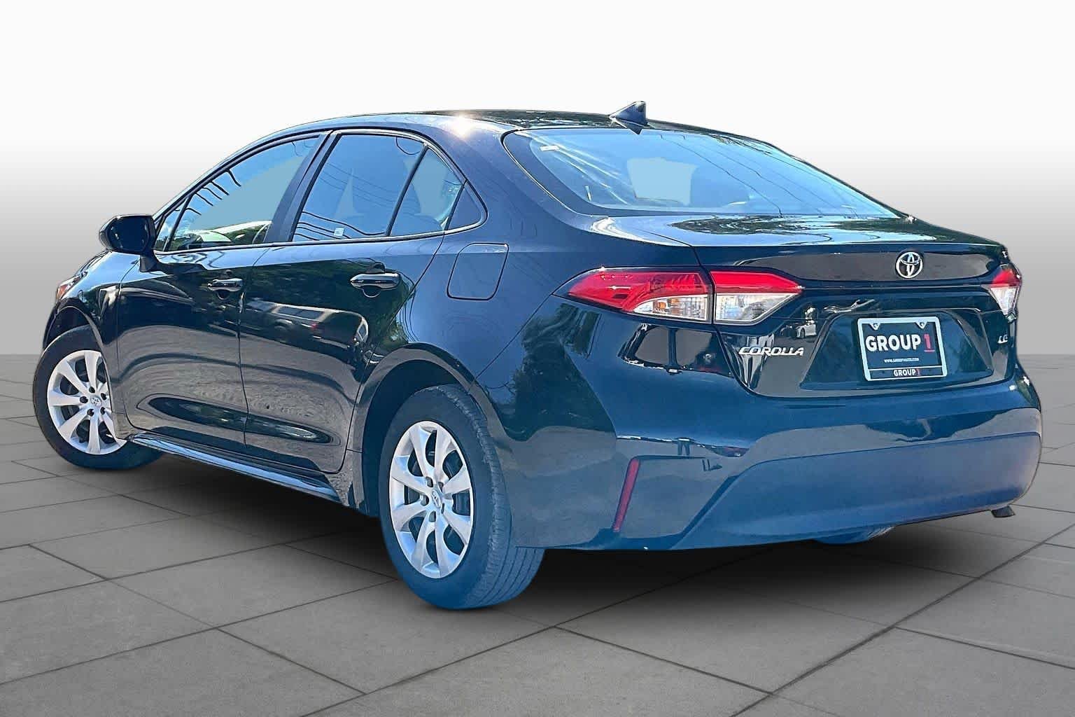 Used 2025 Midnight Black Metallic Toyota LE image 12
