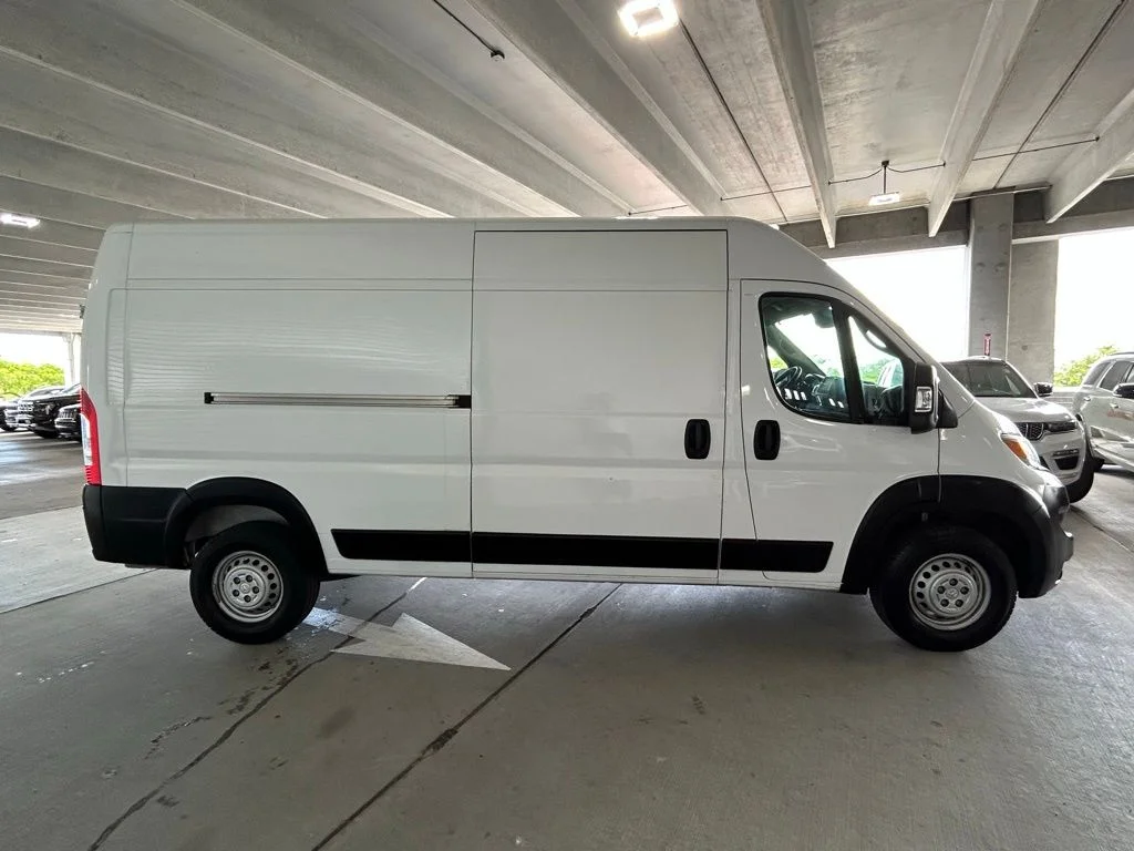 Used 2025 Bright White Clearcoat Ram High Roof image 6