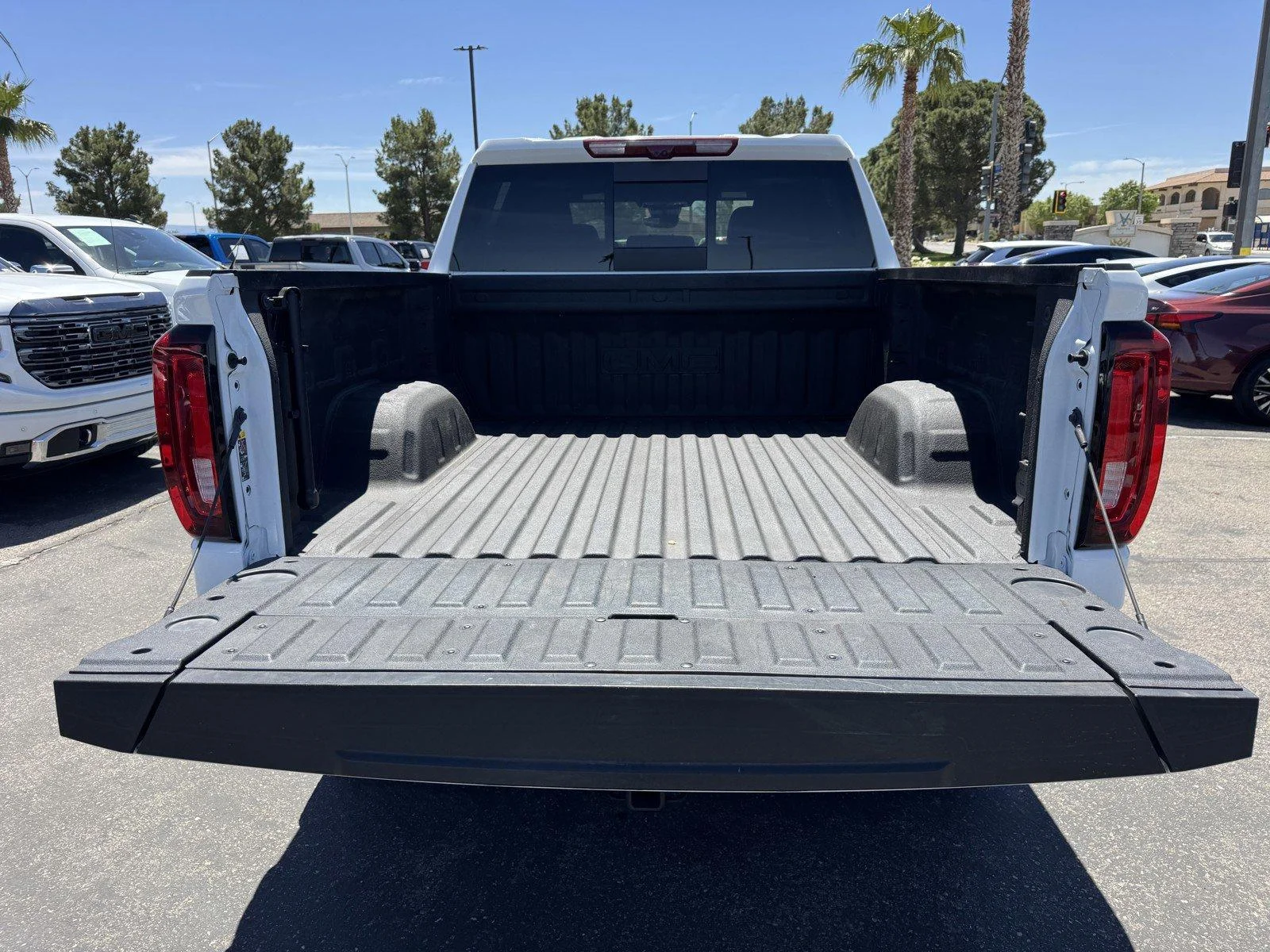 Used 2025 Summit White GMC AT4 image 12