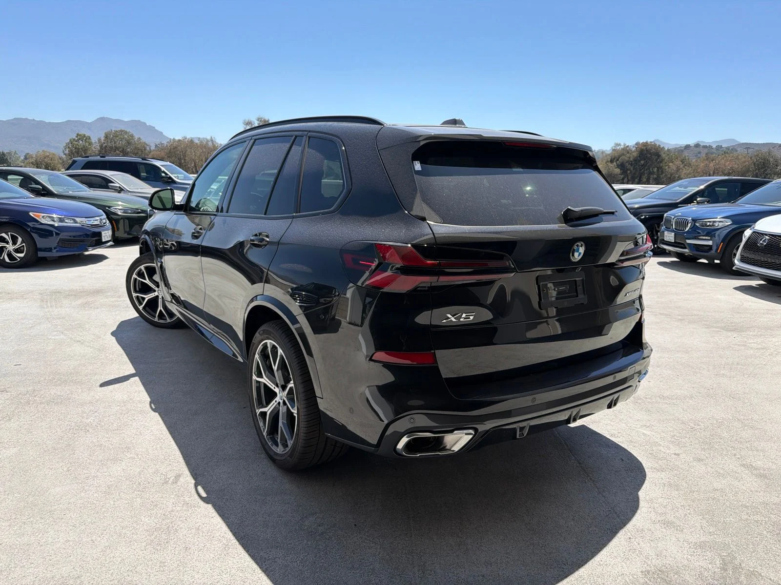 Used 2026 Black Sapphire Metallic BMW xDrive40i image 2