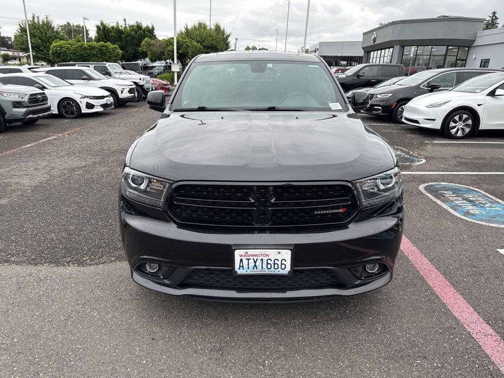 Used 2015 Brilliant Black Crystal Pearlcoat Dodge Limited image 1