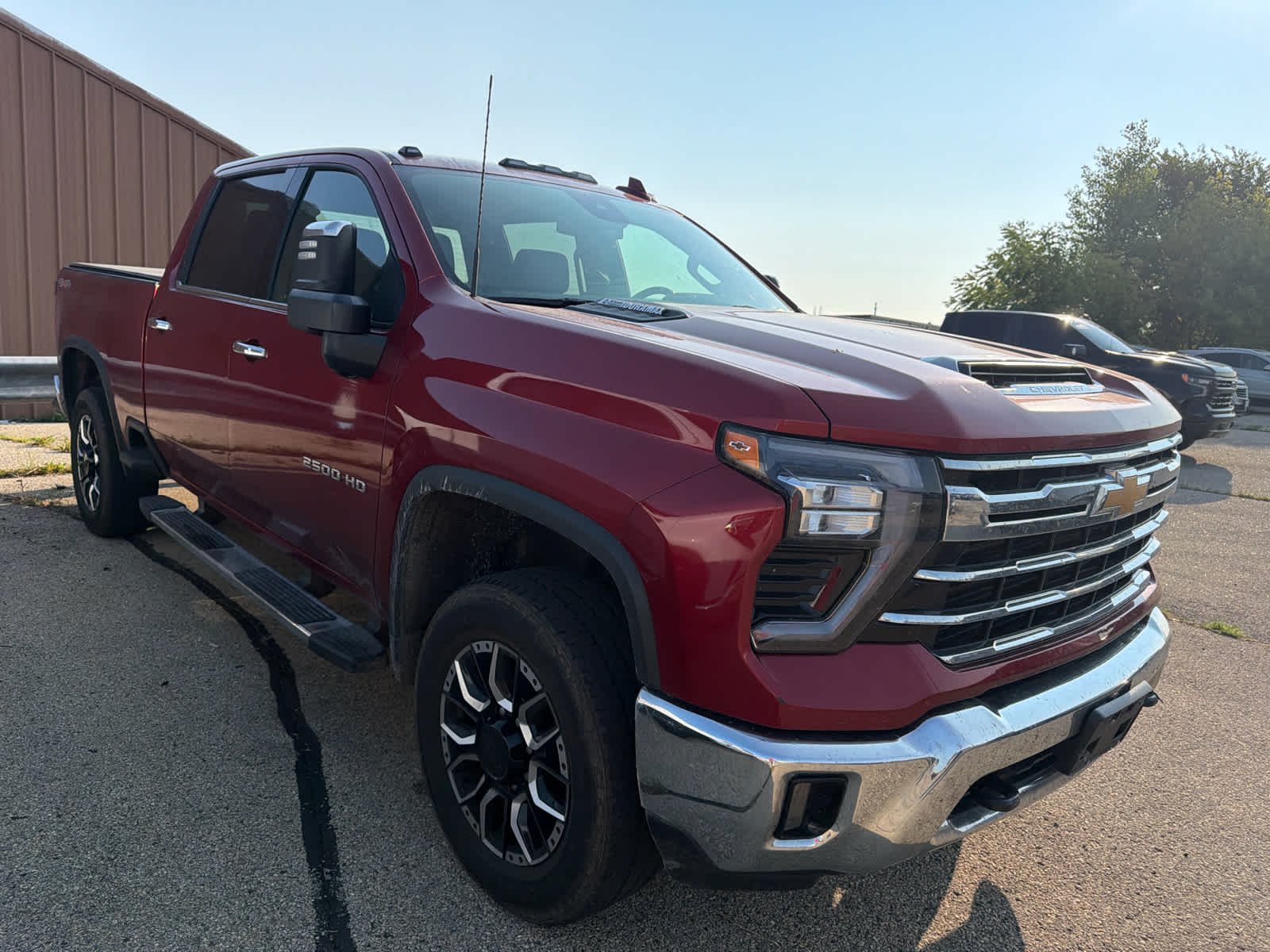 Used 2024 Radiant Red Tintcoat Chevrolet LTZ image 3