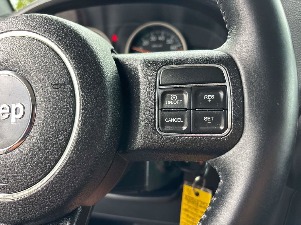 Used 2016 Black Jeep Unlimited Sahara image 17
