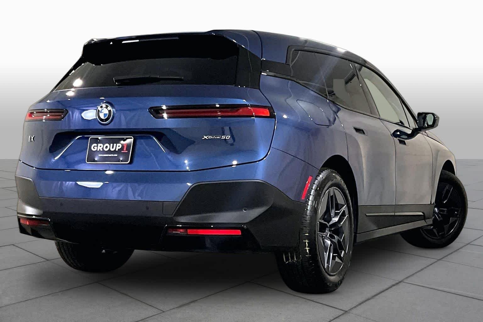 Used 2024 Phytonic Blue Metallic BMW xDrive50 image 12