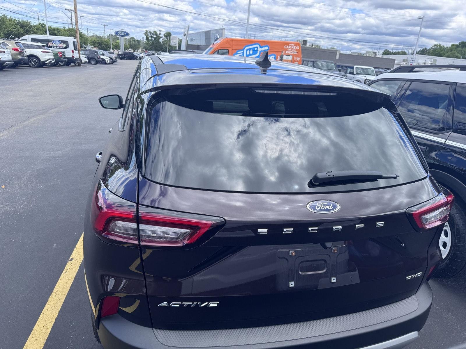 Used 2023 Cinnabar Red Ford Active image 5