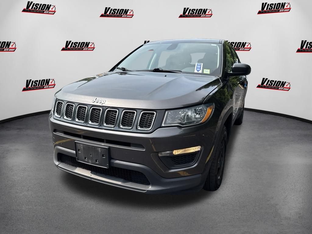Used 2019 Gray Jeep Sport image 1
