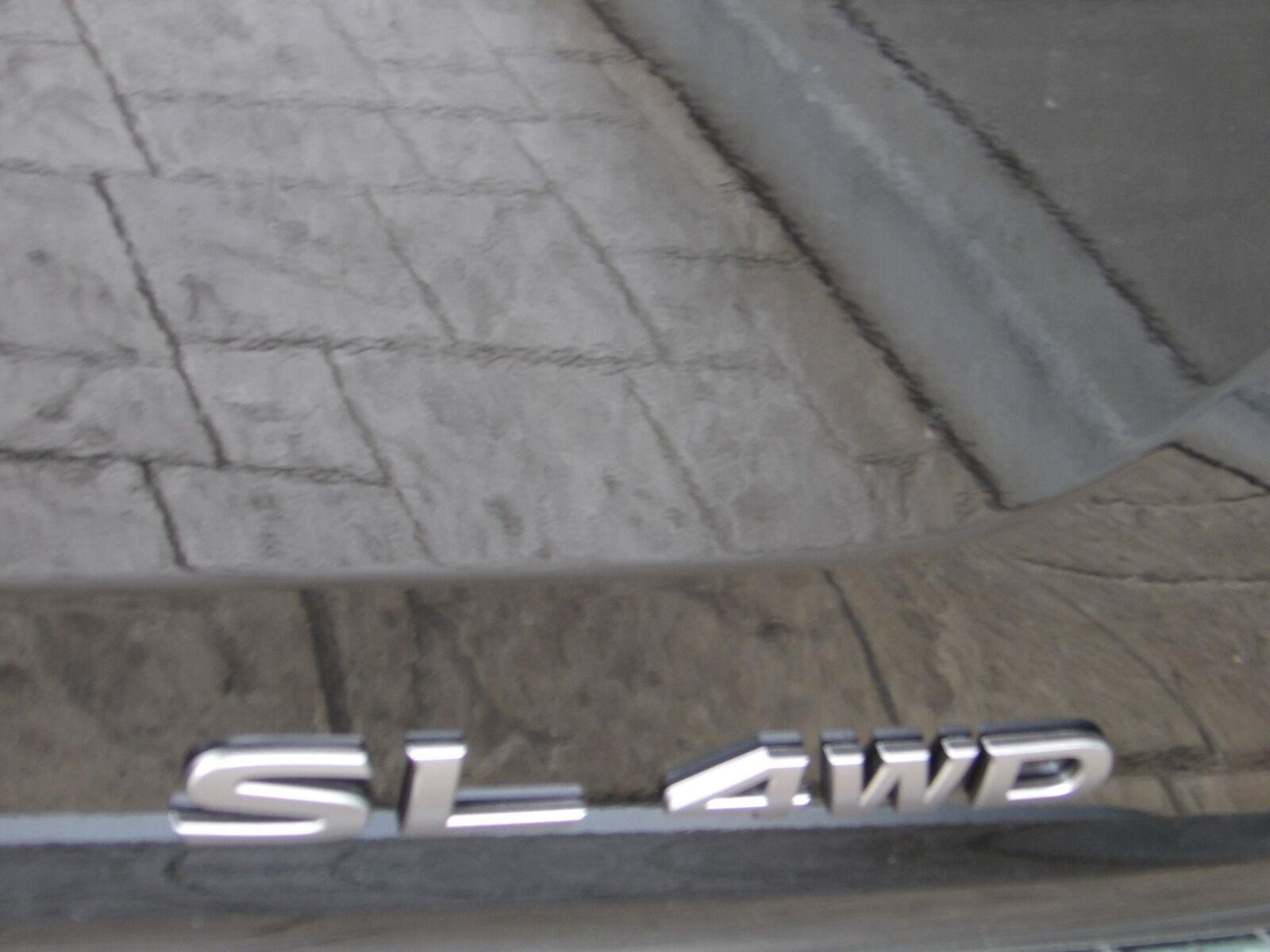 New 2026 Super Black Nissan SL image 8