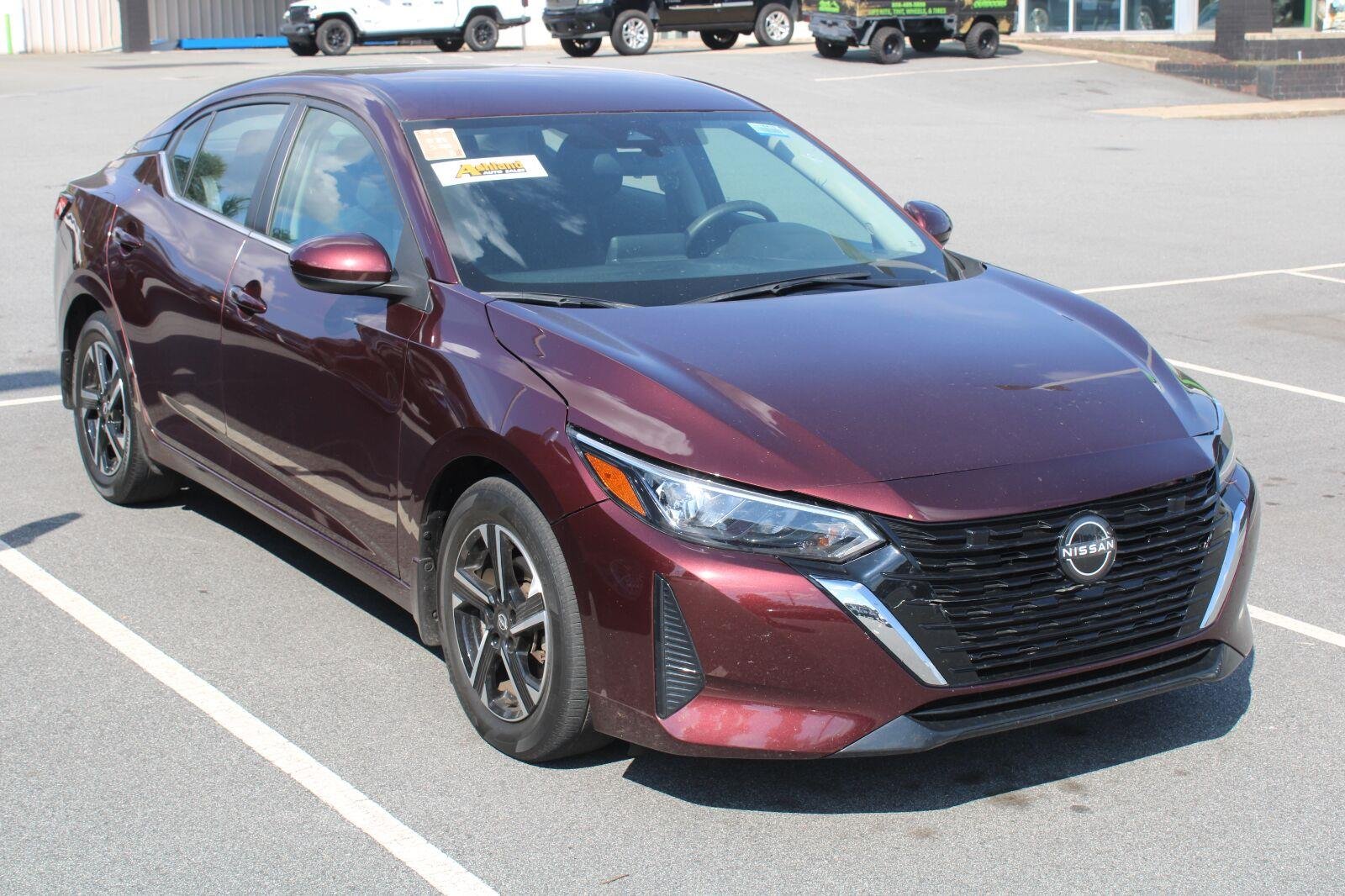 Used 2024 Rosewood Metallic Nissan SV image 3