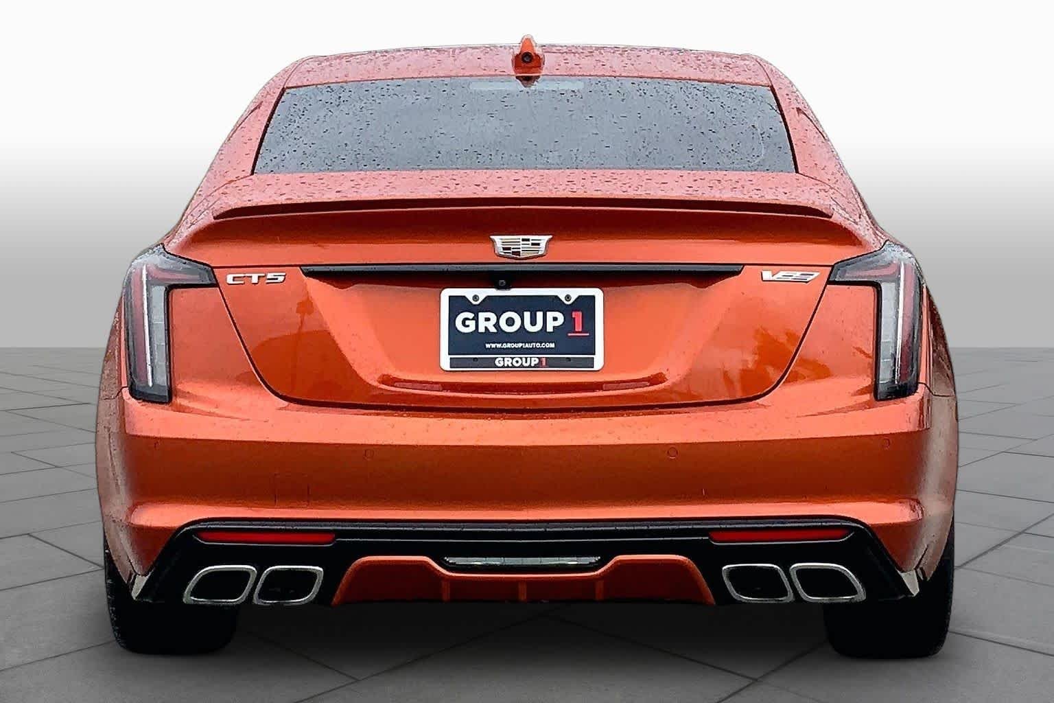 Used 2023 Blaze Orange Metallic Cadillac  image 5