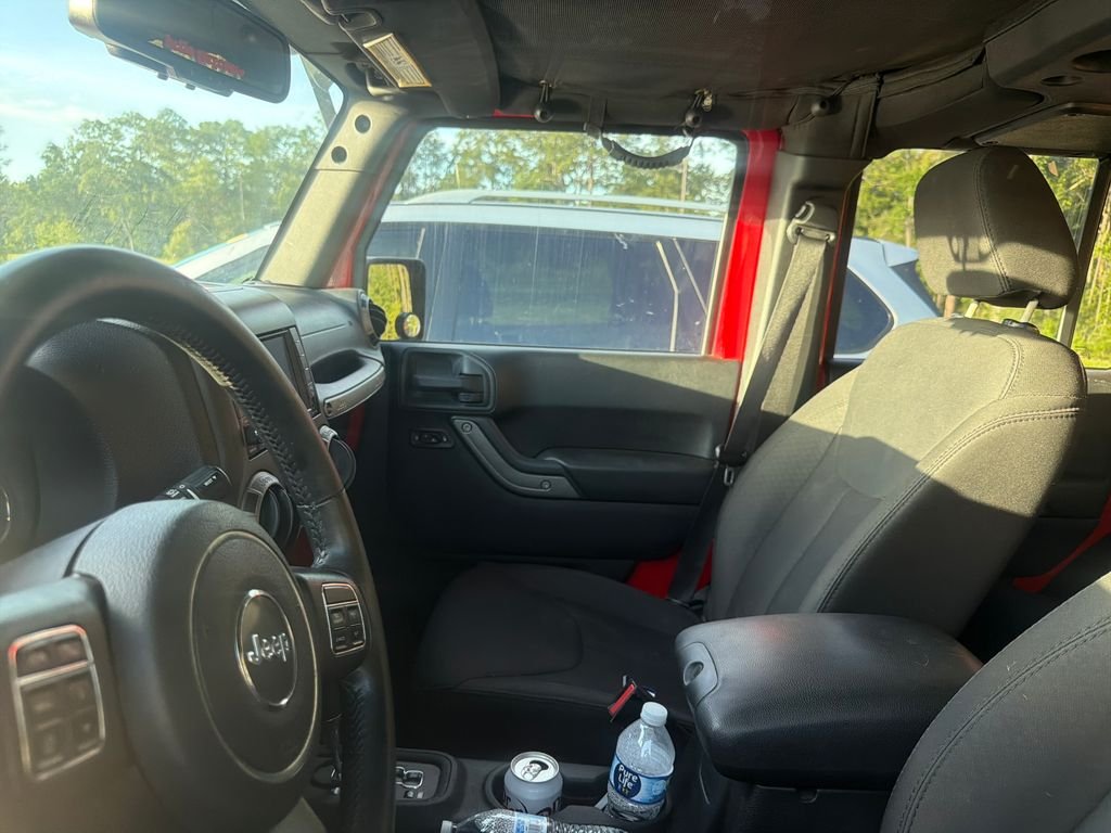 Used 2015 Firecracker Red Clear Coat Jeep Unlimited Sport image 10
