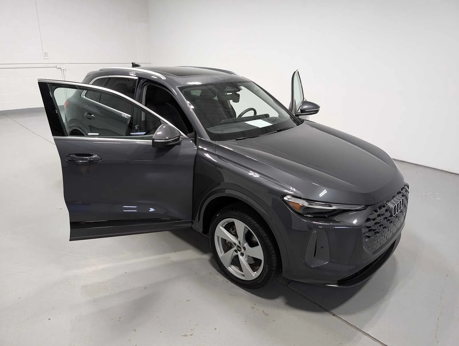 Used 2026 Tambora Gray Metallic Audi Premium Plus image 16