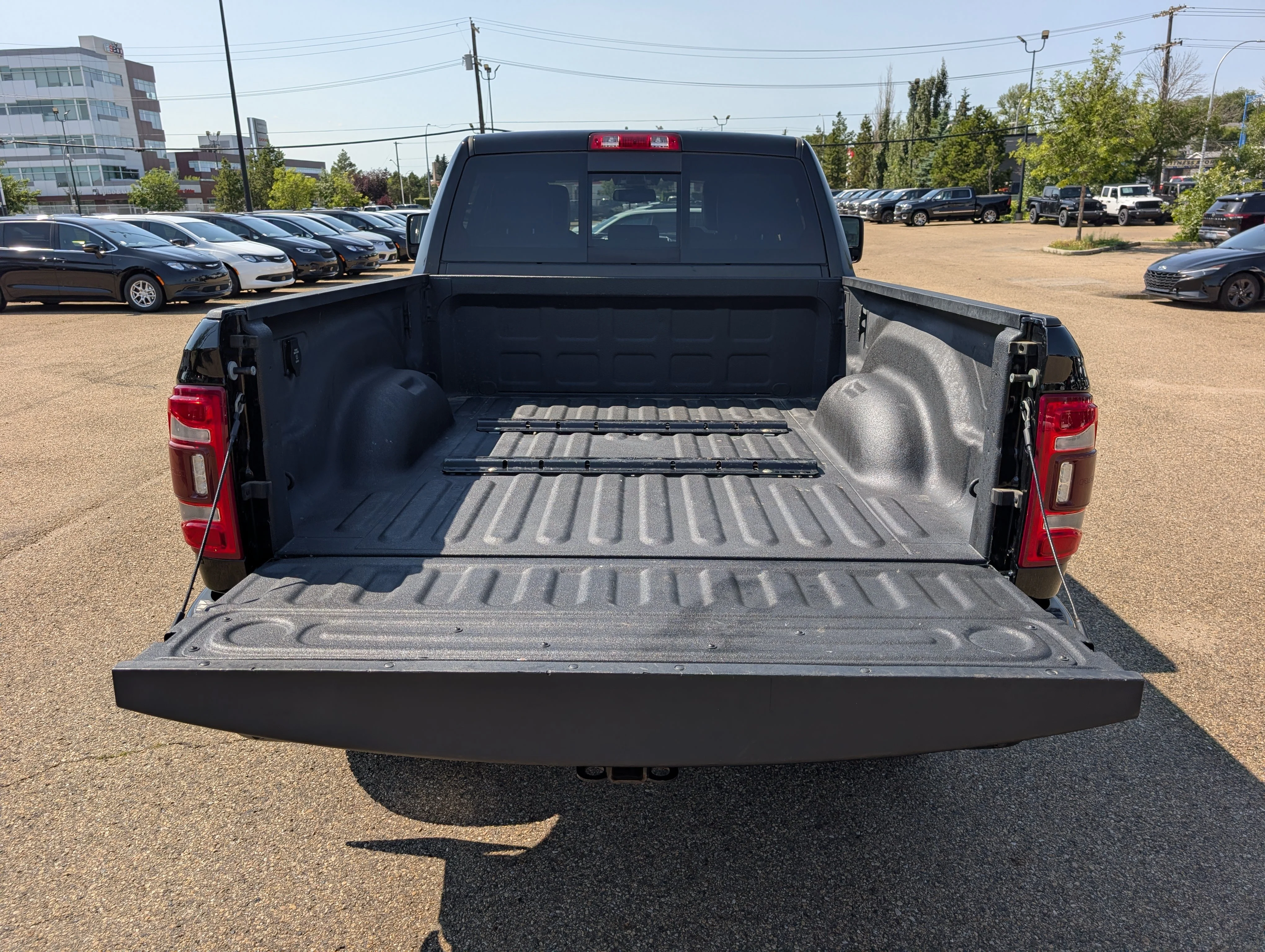 Used 2023 Diamond Black Crystal Pearlcoat Ram Laramie image 6