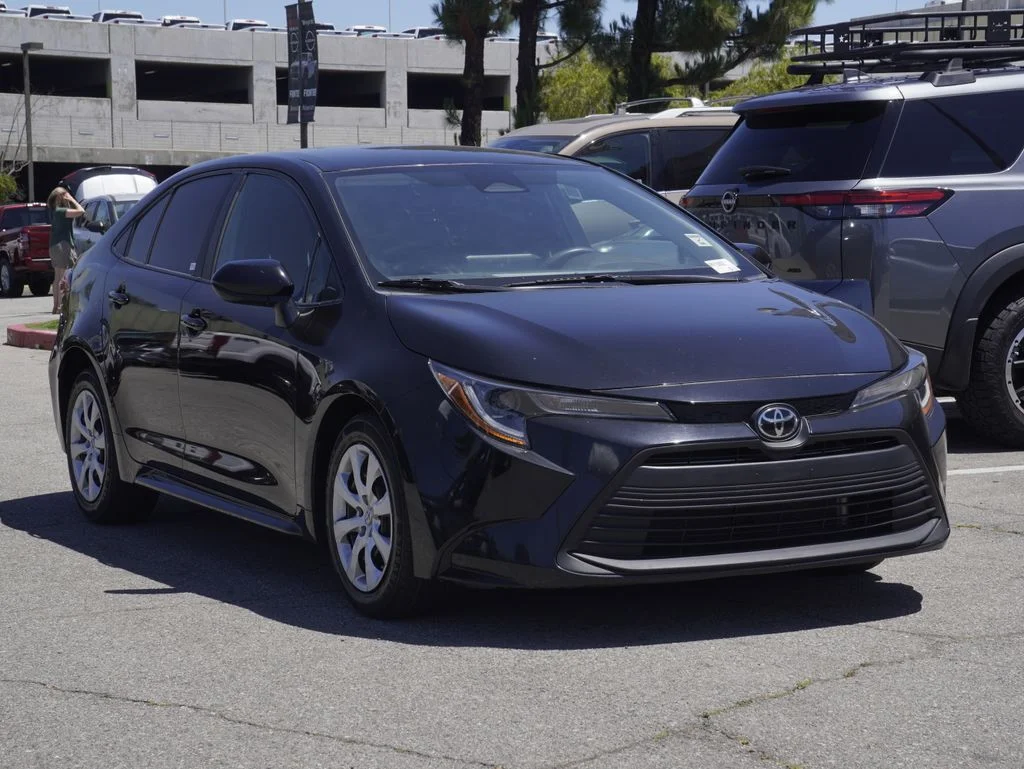 Used 2023 Black Toyota LE image 1