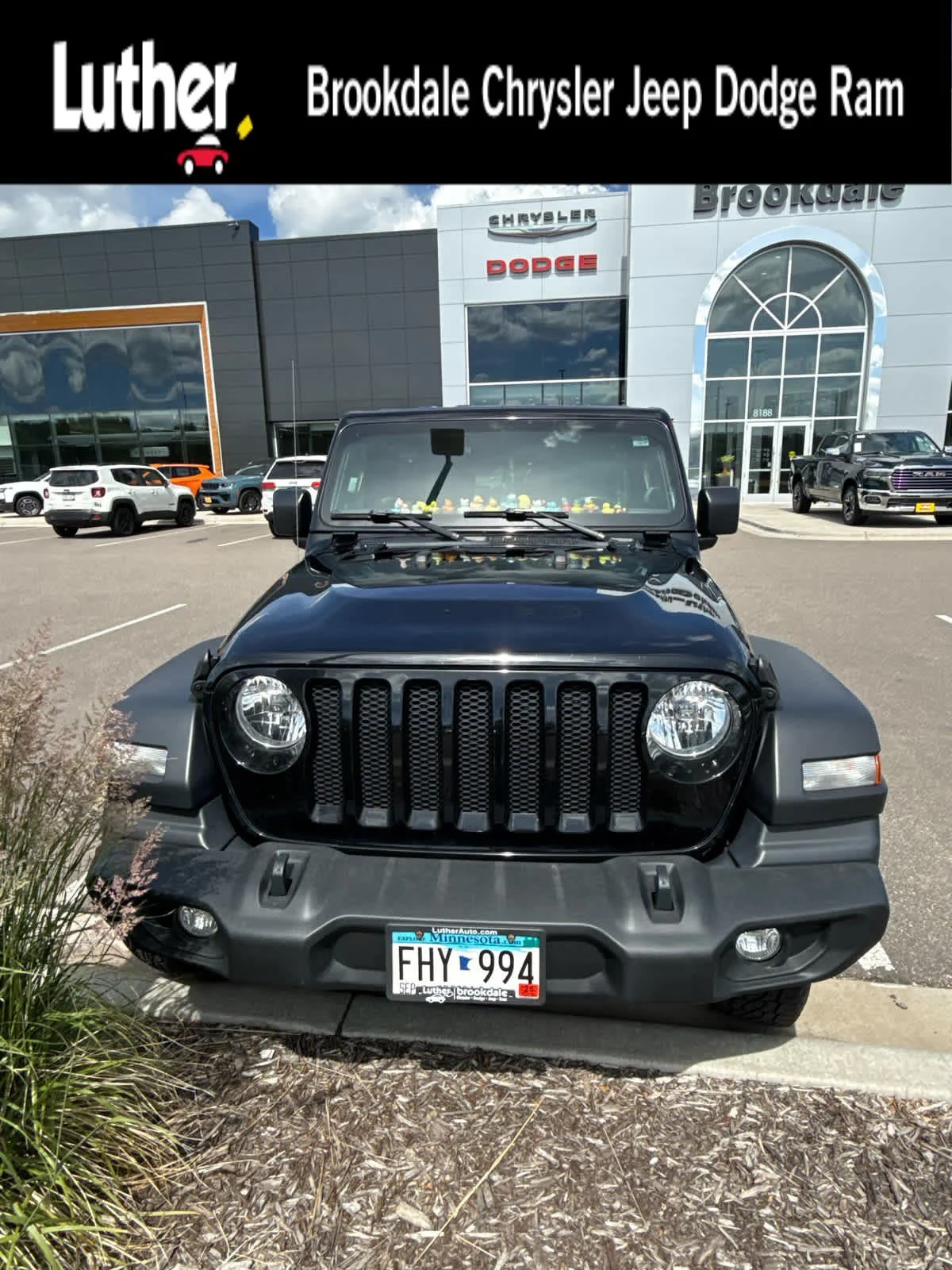 Used 2020 Black Clearcoat Jeep Sport S image 1
