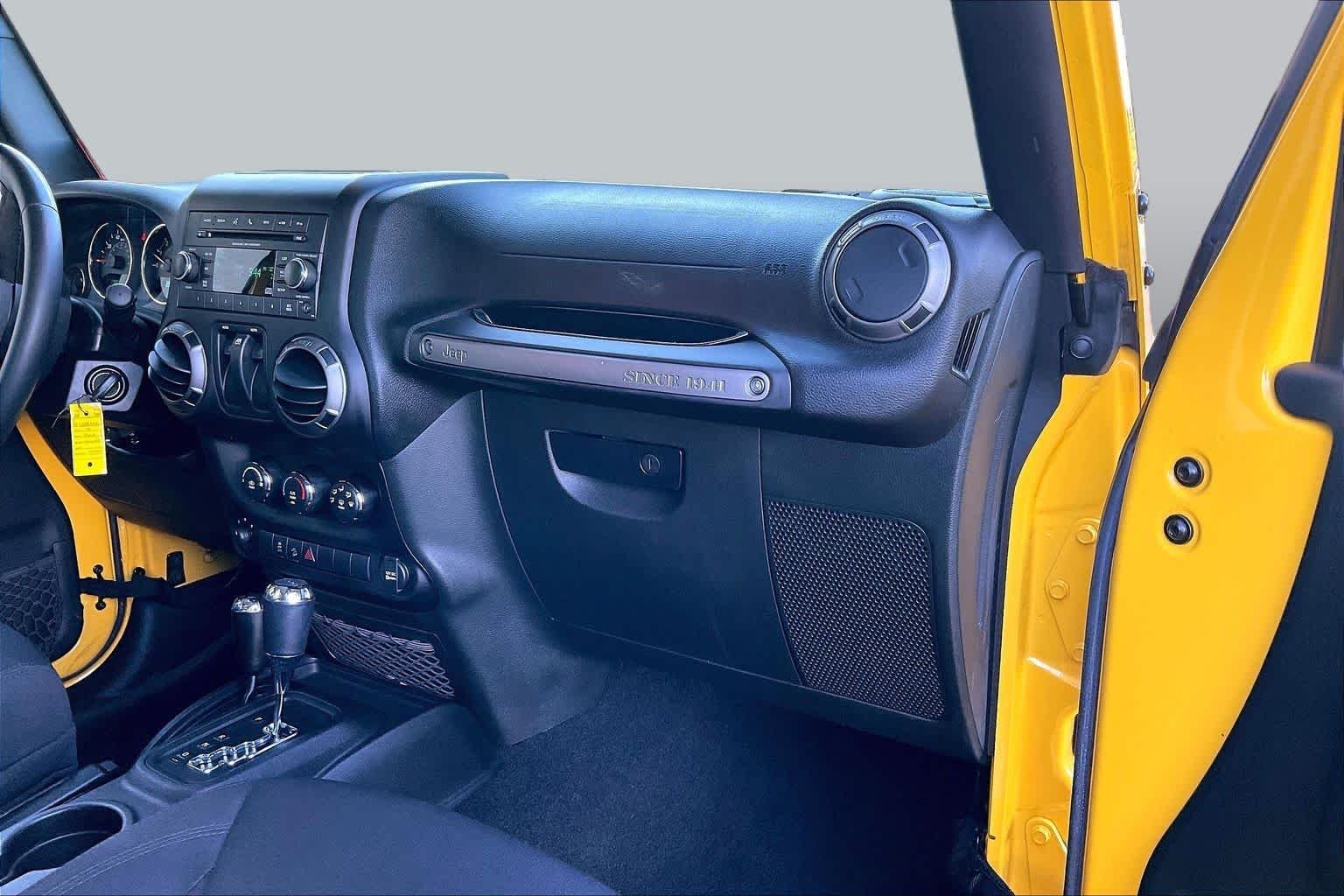 Used 2015 Baja Yellow Clearcoat Jeep Sport image 17