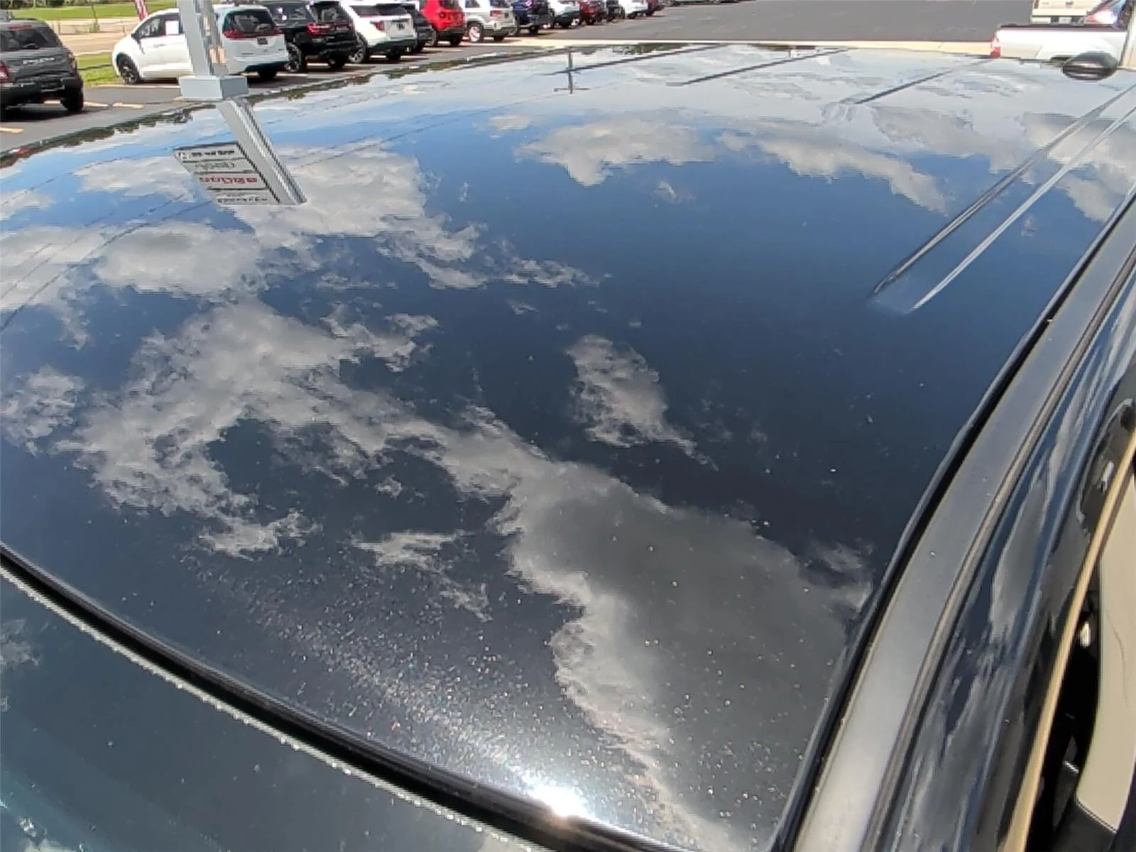 Used 2024 Diamond Black Crystal Pearlcoat Ram SLT image 35