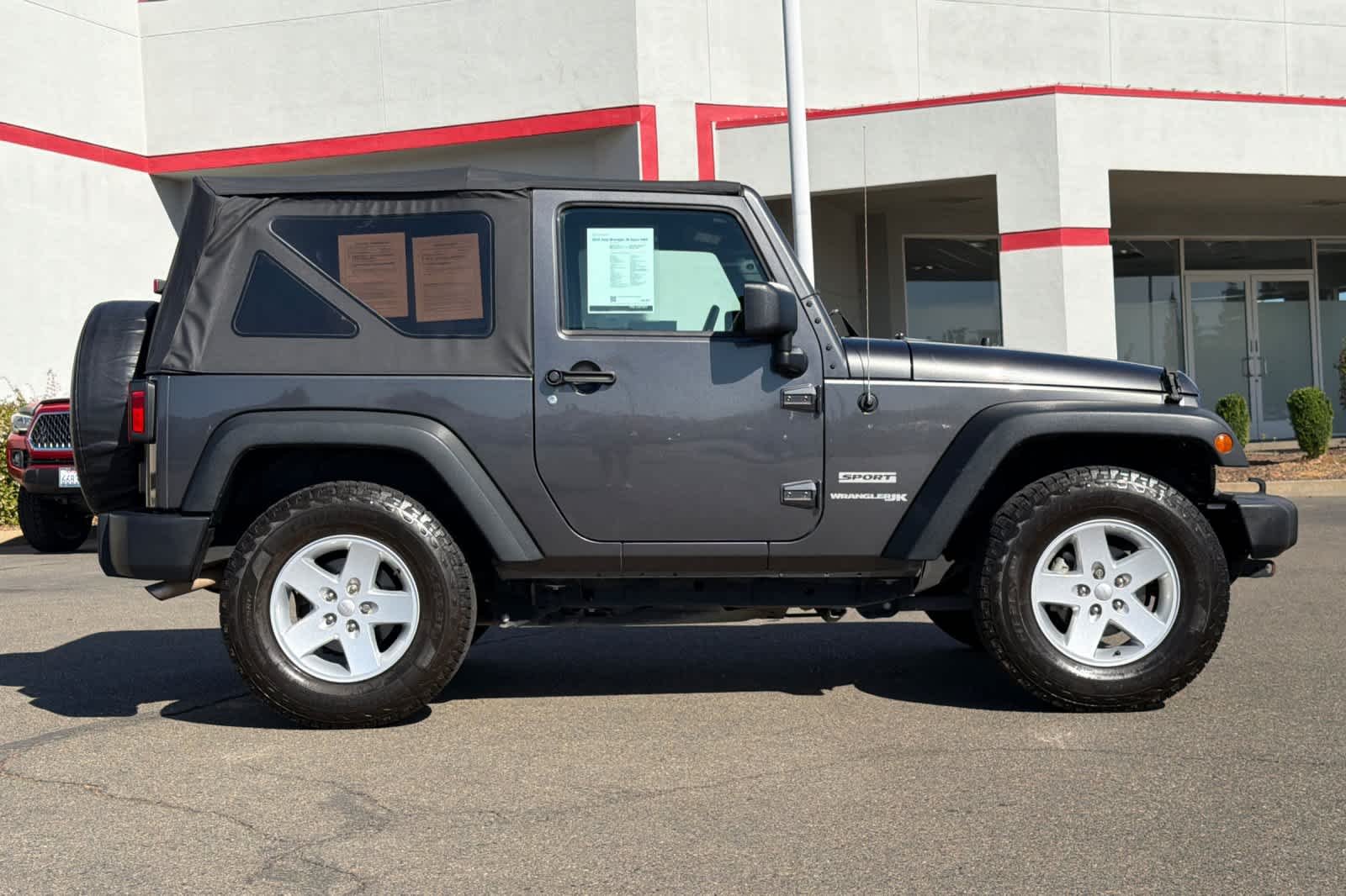 Used 2018 Granite Crystal Metallic Clearcoat Jeep Sport S image 6