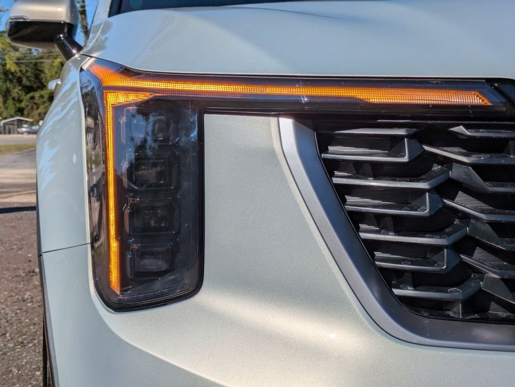 New 2026 Ivory Silver Kia LX image 9