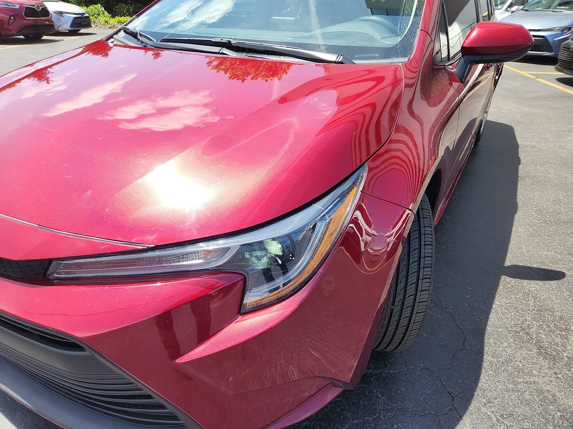 Certified Used 2024 Ruby Flare Pearl Toyota LE image 9