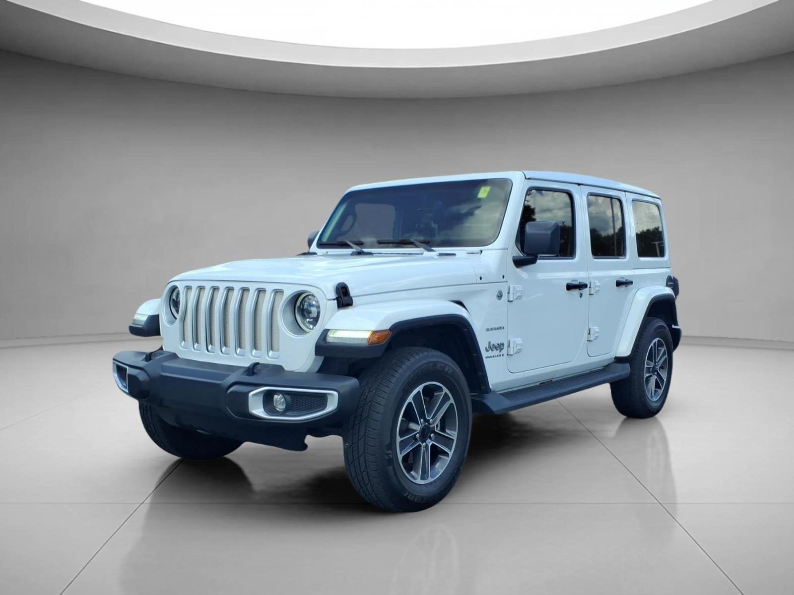 Used 2023 Bright White Clearcoat Jeep Sahara image 1