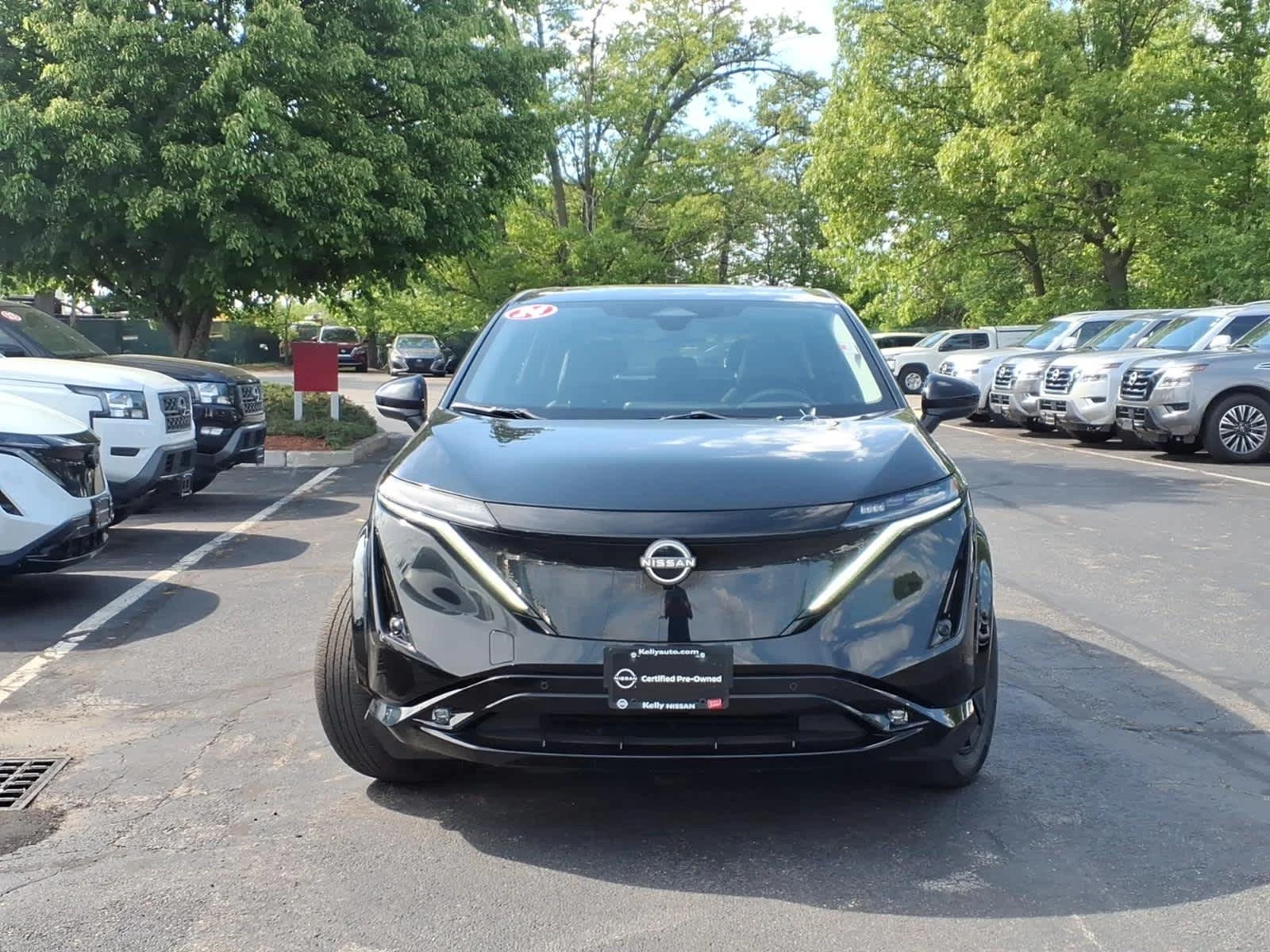 Certified Used 2024 Black Diamond Pearl Nissan EVOLVE+ image 2