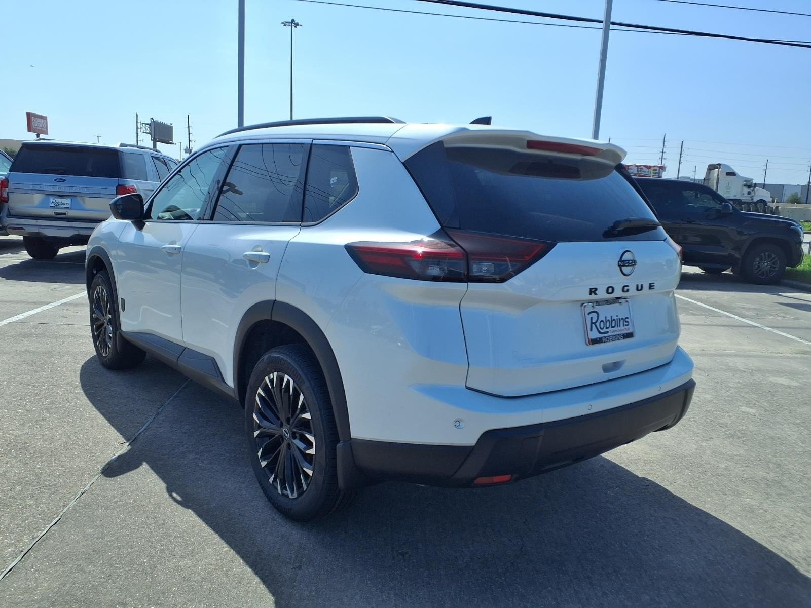 2026 Nissan Rogue Dark Armor™ White at Robbins Nissan